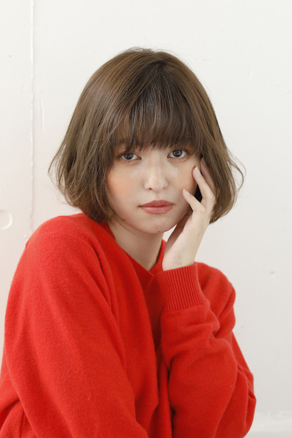 ふんわりミニボブの女性